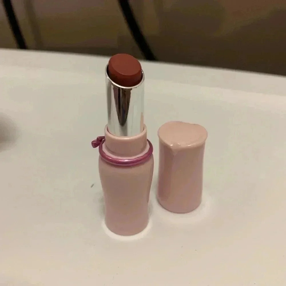 Lipstick Brownish in color ladies product for lips